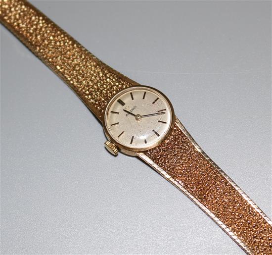 A 9ct gold ladys watch and bracelet